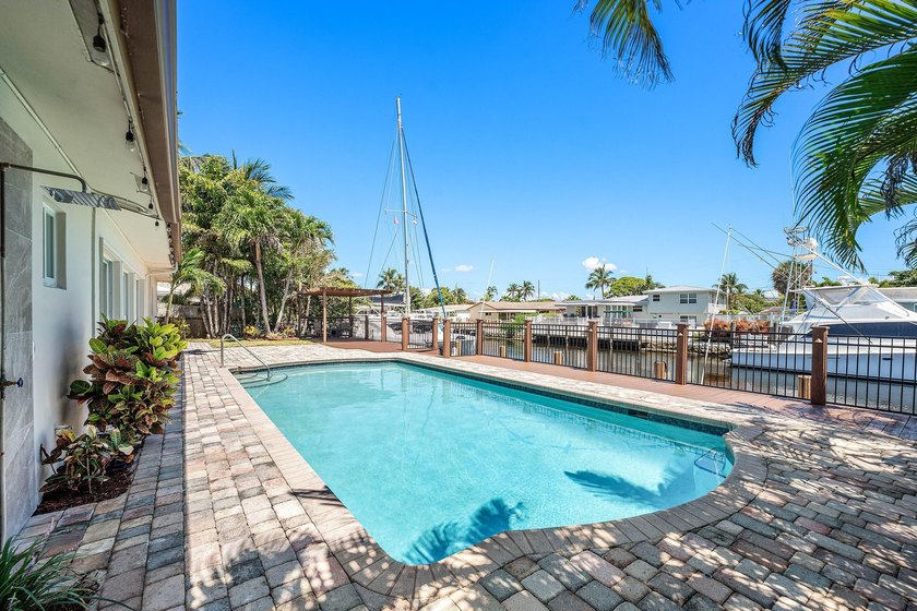 Experience luxury waterfront living in the prestigious Cove of - photo 30