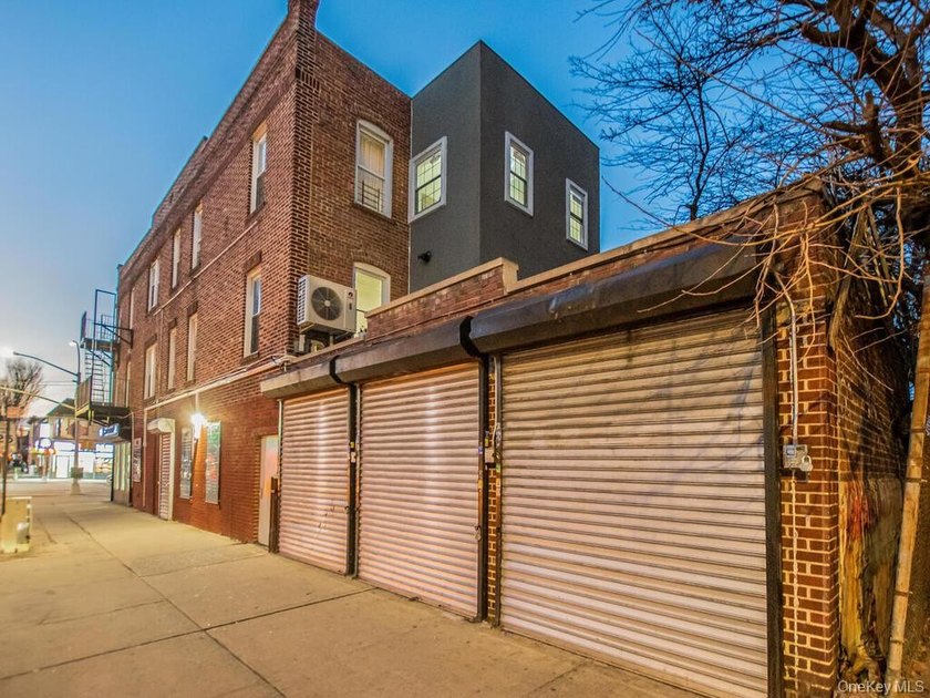 Detached brick mixed-use building with R6 zoning located on busy - photo 31