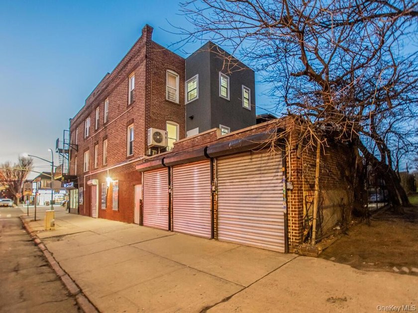 Detached brick mixed-use building with R6 zoning located on busy - photo 32