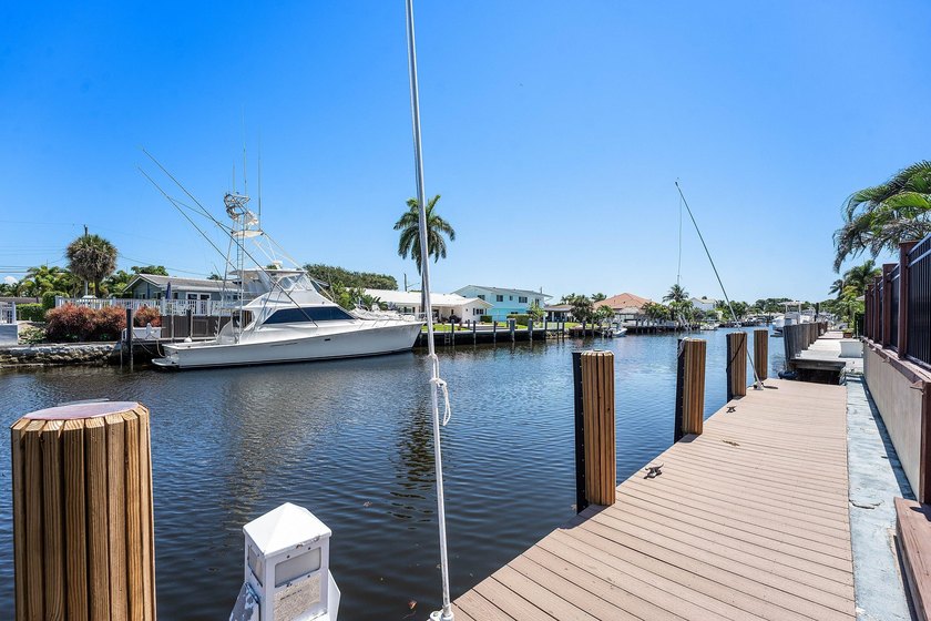 Experience luxury waterfront living in the prestigious Cove of - photo 32