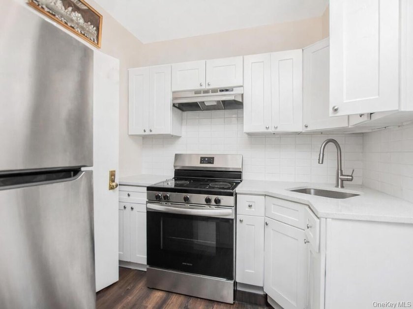 Detached brick mixed-use building with R6 zoning located on busy - photo 34