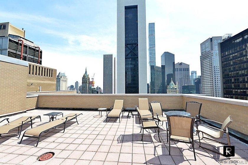 Step into sophisticated urban living in this stunning, barely - photo 14