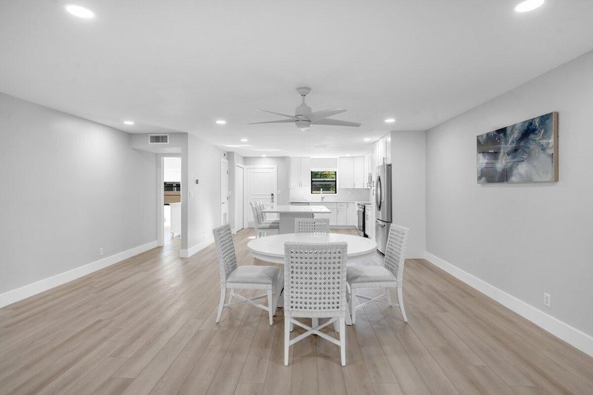 A fully renovated, white-and-bright coastal contemporary retreat - photo 9