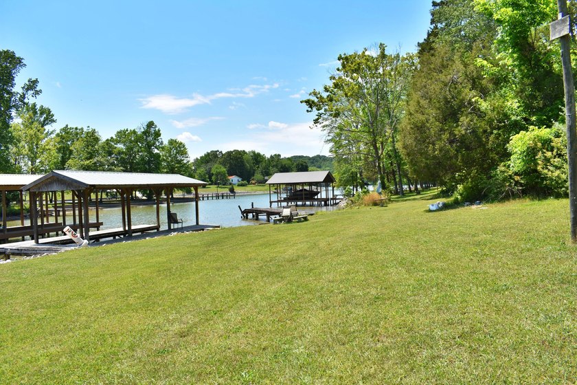 Unlock the potential of this charming lakefront fixer-upper on - photo 5