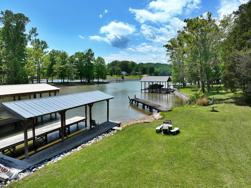 Unlock the potential of this charming lakefront fixer-upper on - photo 8