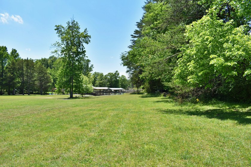 Unlock the potential of this charming lakefront fixer-upper on - photo 10