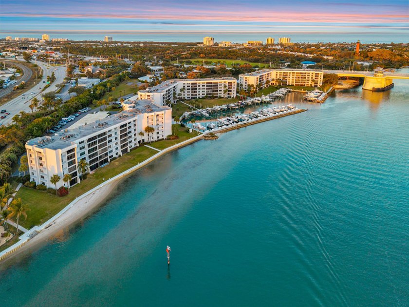 Experience elevated coastal living in this immaculate, fully - photo 2