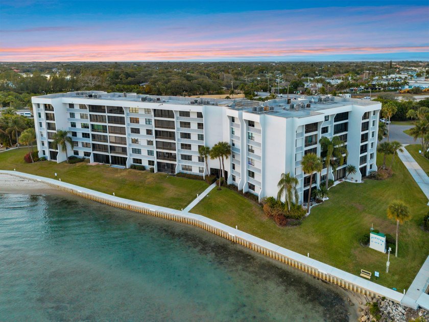 Experience elevated coastal living in this immaculate, fully - photo 4