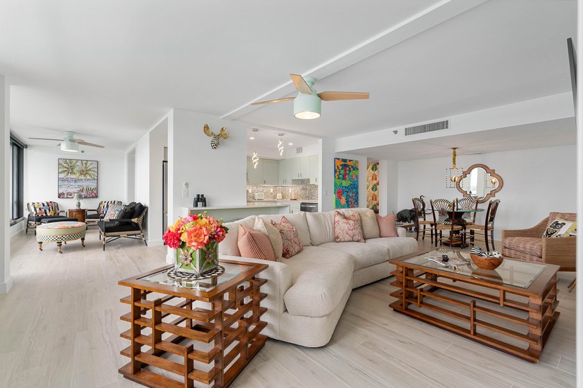 Experience elevated coastal living in this immaculate, fully - photo 9