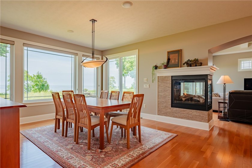 Welcome to waterfront living at its finest. Perched above the - photo 15