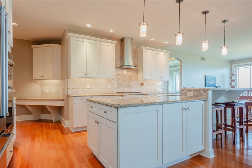 Welcome to waterfront living at its finest. Perched above the - photo 19