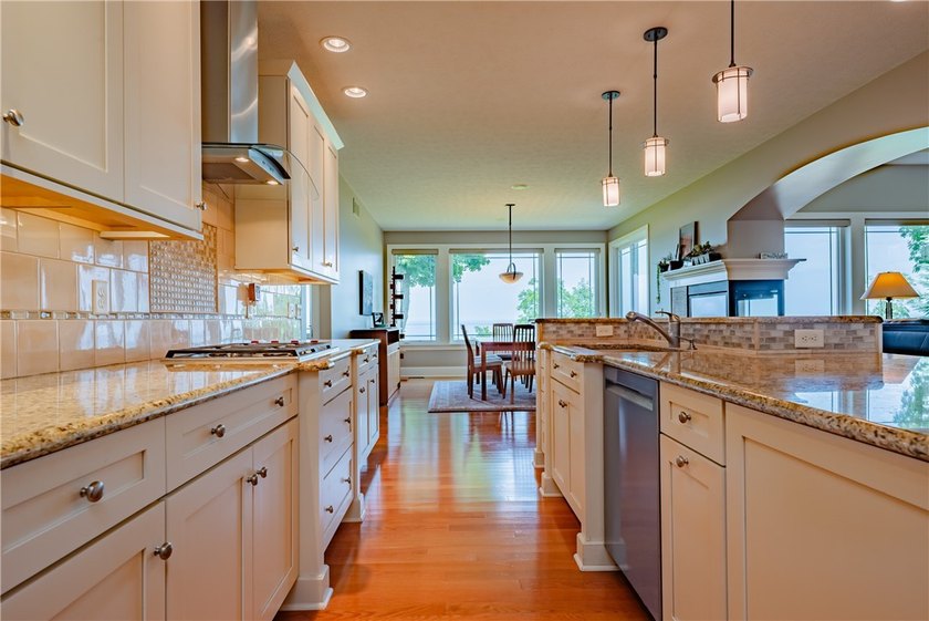 Welcome to waterfront living at its finest. Perched above the - photo 22