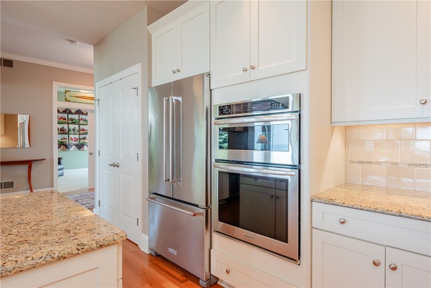 Welcome to waterfront living at its finest. Perched above the - photo 24
