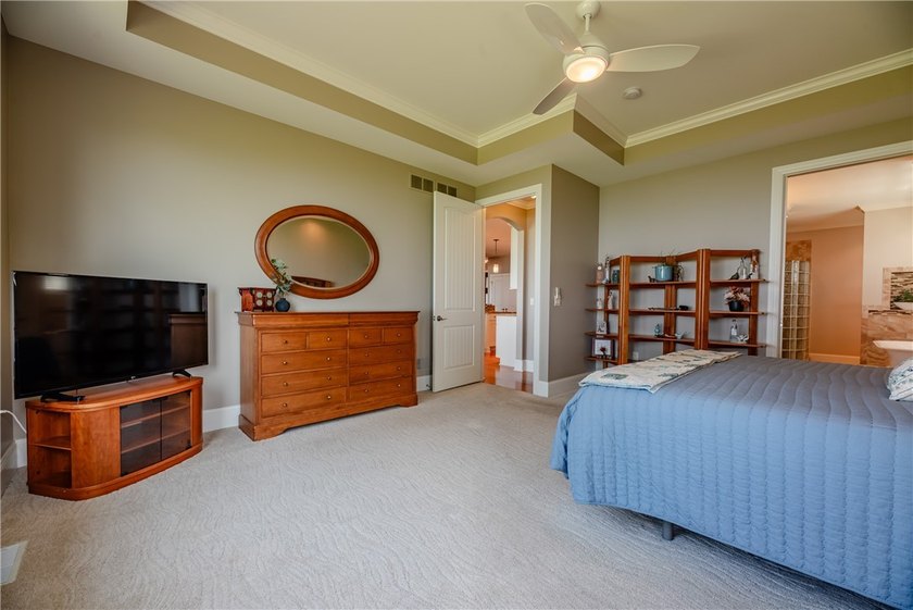 Welcome to waterfront living at its finest. Perched above the - photo 30