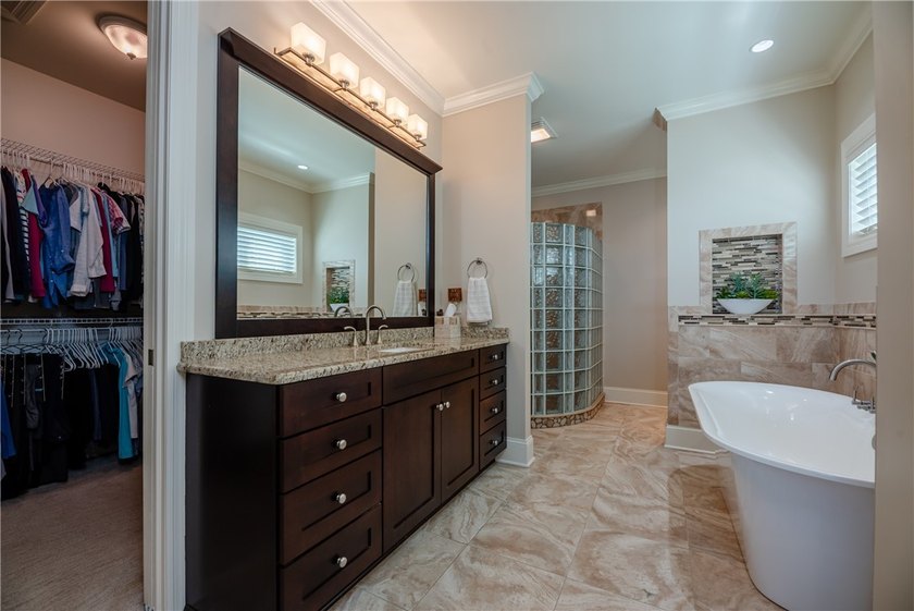 Welcome to waterfront living at its finest. Perched above the - photo 31