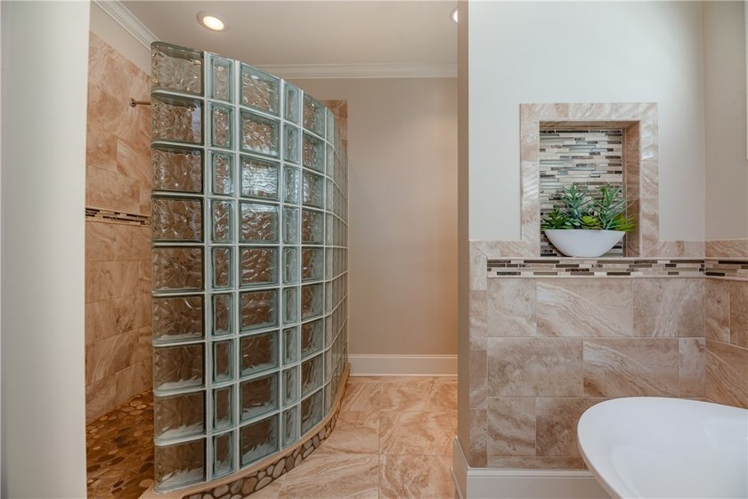 Welcome to waterfront living at its finest. Perched above the - photo 32