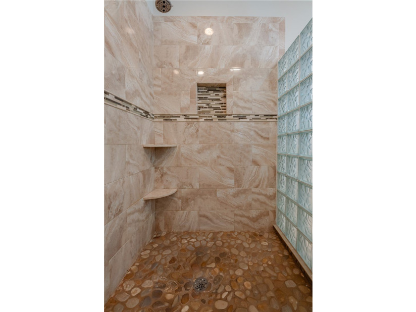Welcome to waterfront living at its finest. Perched above the - photo 33