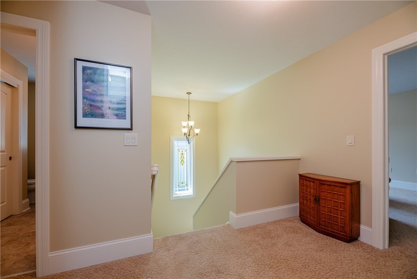 Welcome to waterfront living at its finest. Perched above the - photo 36