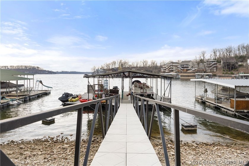 Discover the ultimate lakefront retreat with this stunningly - photo 30