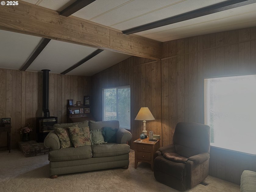 This well-maintained manufactured home is tucked in the hills - photo 2