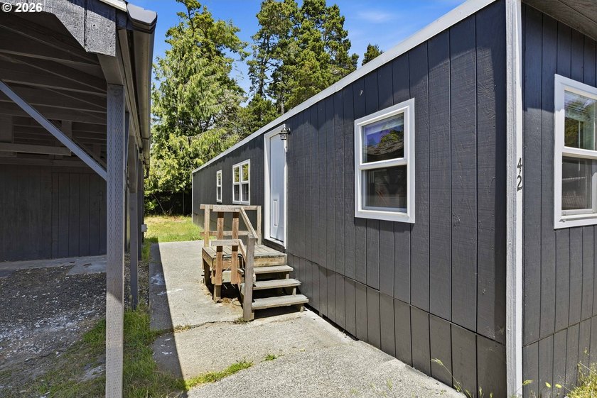 Move-in ready and fully remodeled! This 2-bedroom, 1-bath home - photo 3