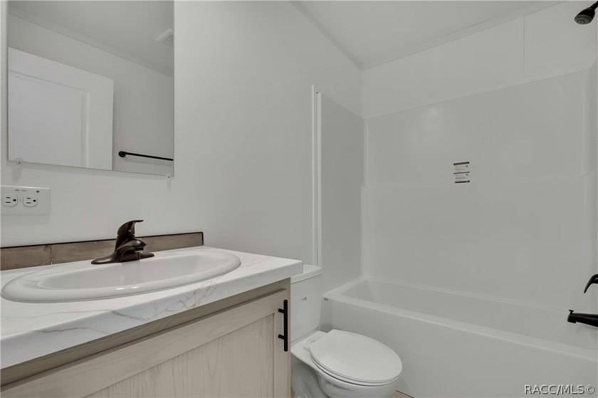 Welcome home to this brand-new 2026 home, perfectly situated on - photo 23