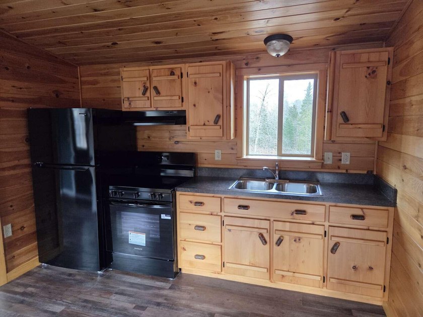 Move-in ready cabin with deeded access to Indian Pond in St - photo 7