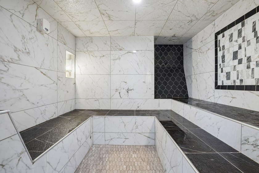 Elevated above the city on the 19th floor, this stunning corner - photo 46