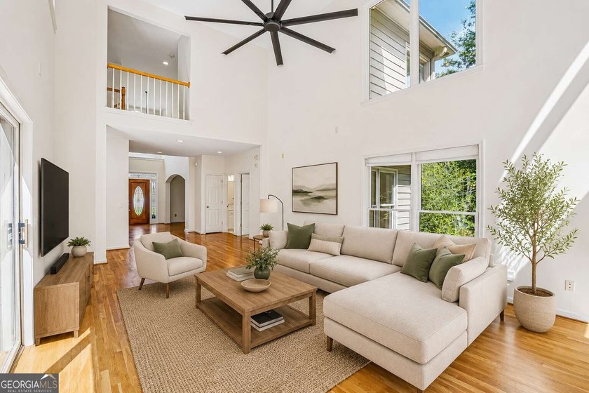 Nestled on a quiet cul-de-sac lot backing to acres of private - photo 2