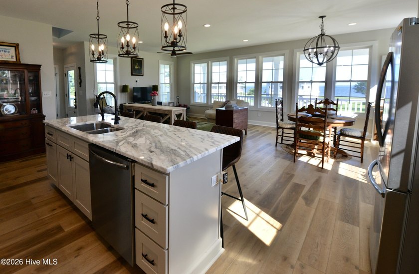 Discover elevated coastal living in Whittaker Point, one of - photo 13