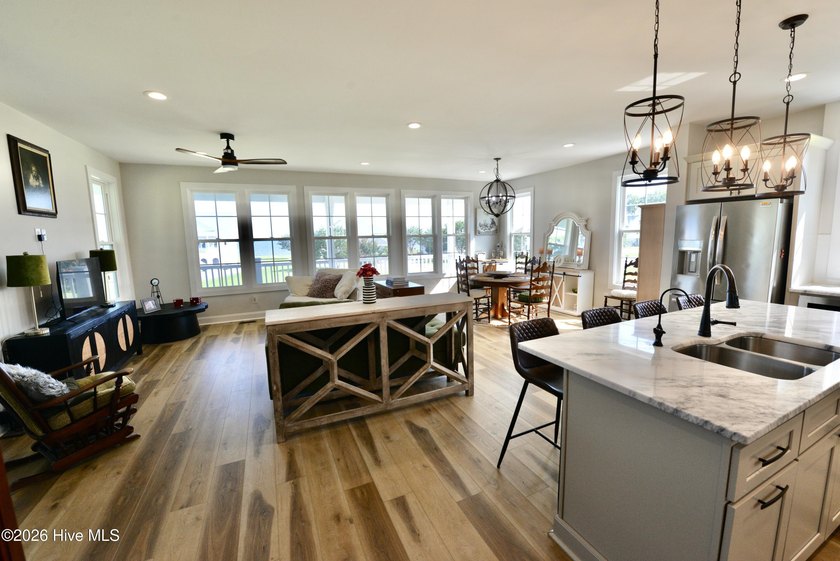 Discover elevated coastal living in Whittaker Point, one of - photo 14