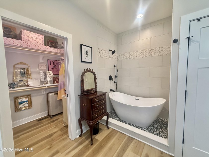 Discover elevated coastal living in Whittaker Point, one of - photo 19