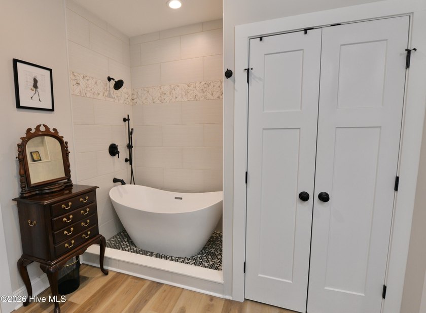 Discover elevated coastal living in Whittaker Point, one of - photo 21