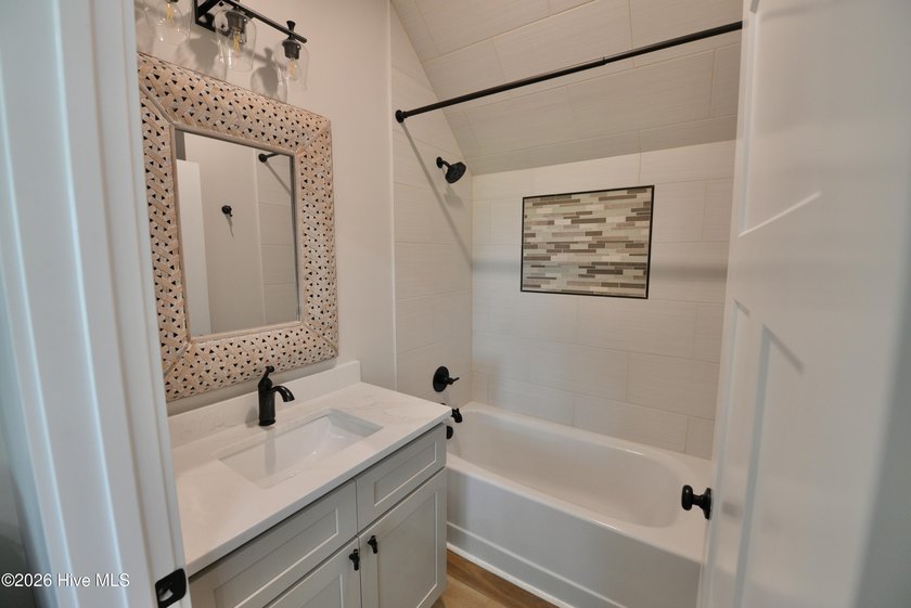 Discover elevated coastal living in Whittaker Point, one of - photo 23