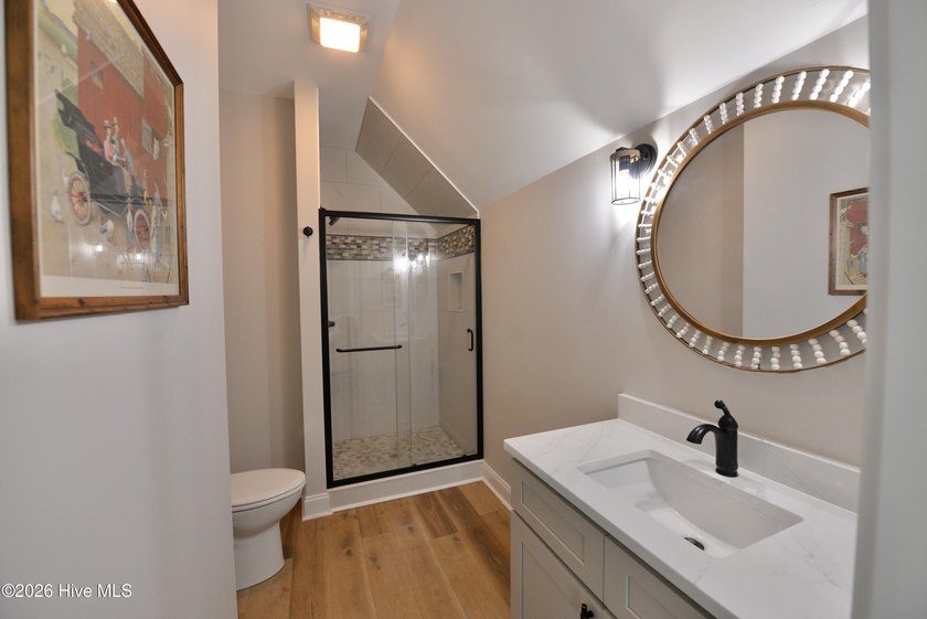 Discover elevated coastal living in Whittaker Point, one of - photo 25