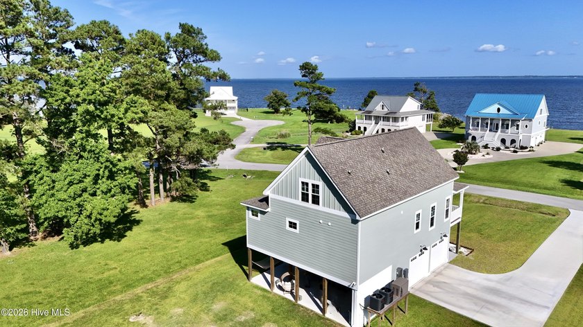 Discover elevated coastal living in Whittaker Point, one of - photo 32