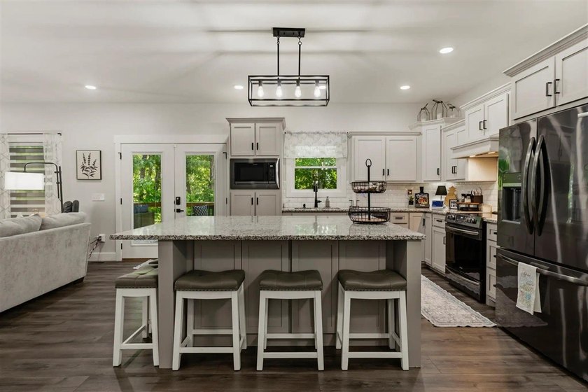 LIVE THE LAKE LIFE - WITH LAKE VIEWS AND RARE WALKABLE TO THE - photo 6
