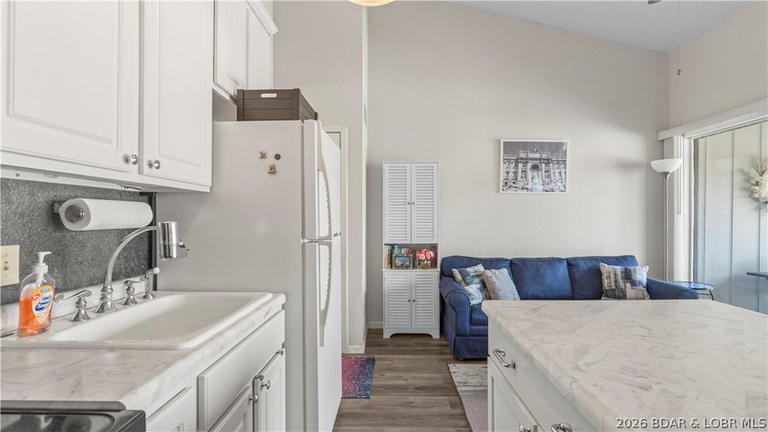 Experience the ultimate lake lifestyle at Heron Bay, a premier - photo 12