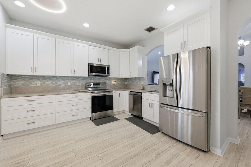 Beautifully updated and backing to a peaceful preserve, this - photo 14