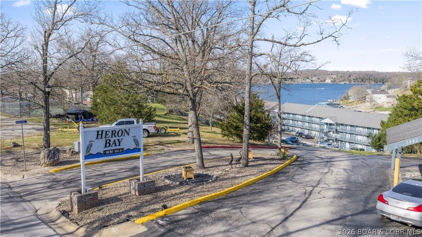 Experience the ultimate lake lifestyle at Heron Bay, a premier - photo 20