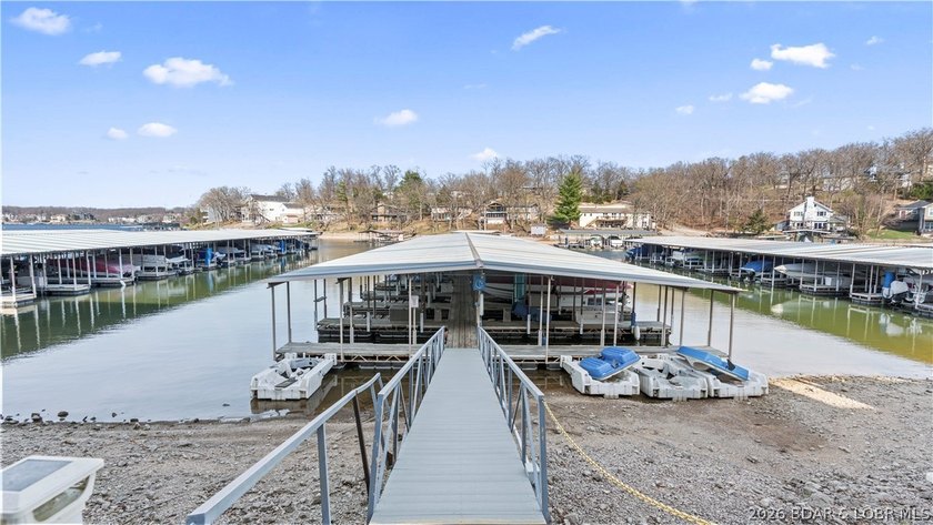 Experience the ultimate lake lifestyle at Heron Bay, a premier - photo 25