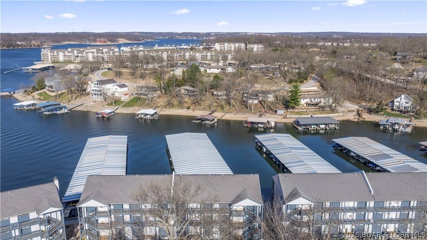Experience the ultimate lake lifestyle at Heron Bay, a premier - photo 32
