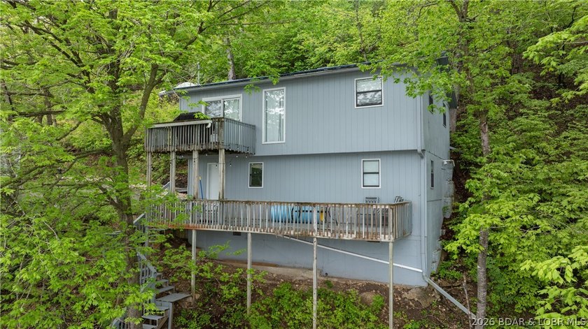 Lakefront living in a wide, quiet cove on the Gravois Arm! - photo 25