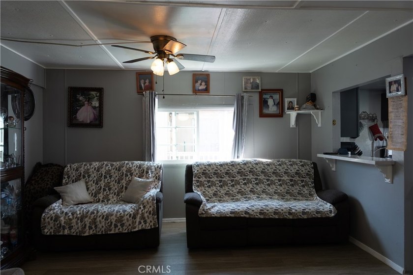 Ready to move in! This affordable, low land lease mobile home in - photo 6