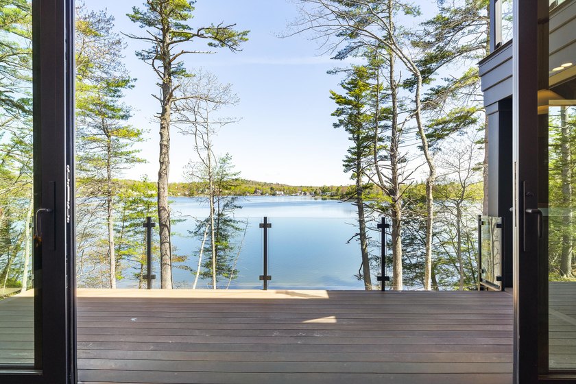Perched high above the Damariscotta River with sweeping views of - photo 3