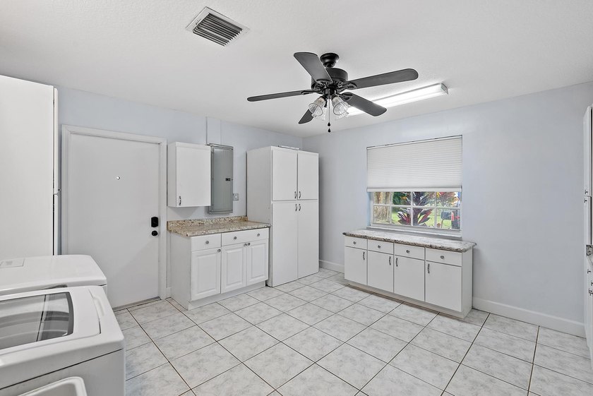 Back on the Market! NEW ROOF!Jupiter Farms Acre+ Retreat with - photo 19