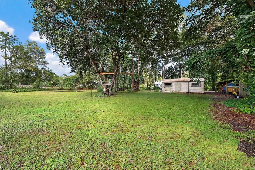 Back on the Market! NEW ROOF!Jupiter Farms Acre+ Retreat with - photo 26