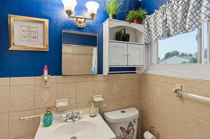 This charming 3-bedroom, 1-bath ranch offers comfortable - photo 12