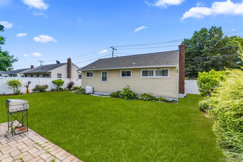 This charming 3-bedroom, 1-bath ranch offers comfortable - photo 26