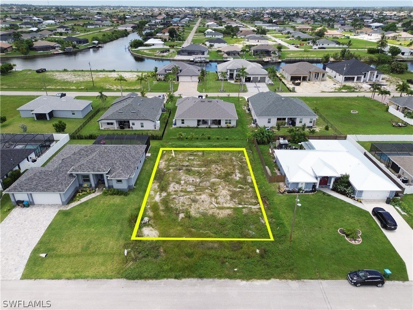 This stunning lot comes with permits and architectural plans to - photo 2